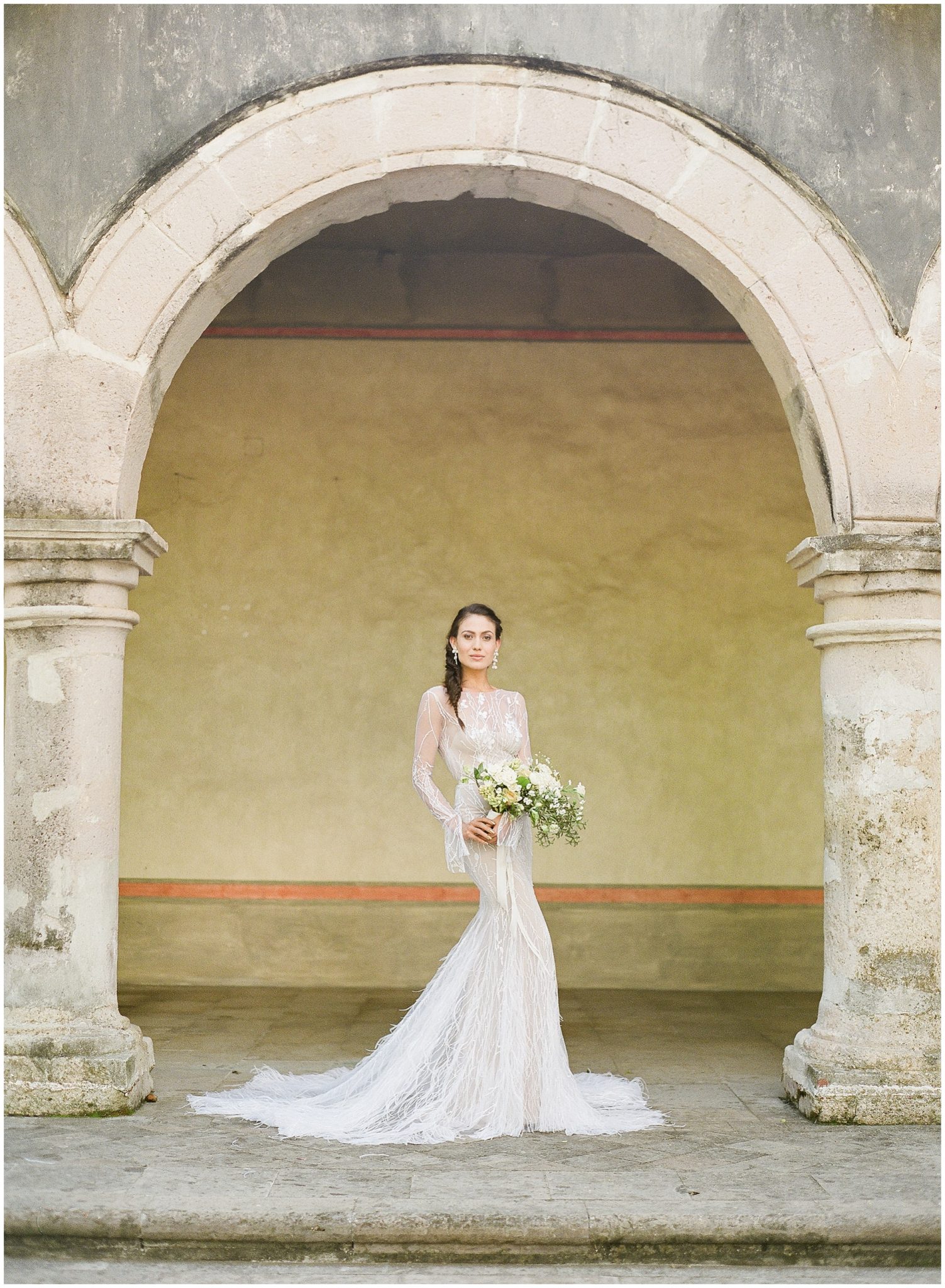 a bride wearing a Mira Zwillinger gown