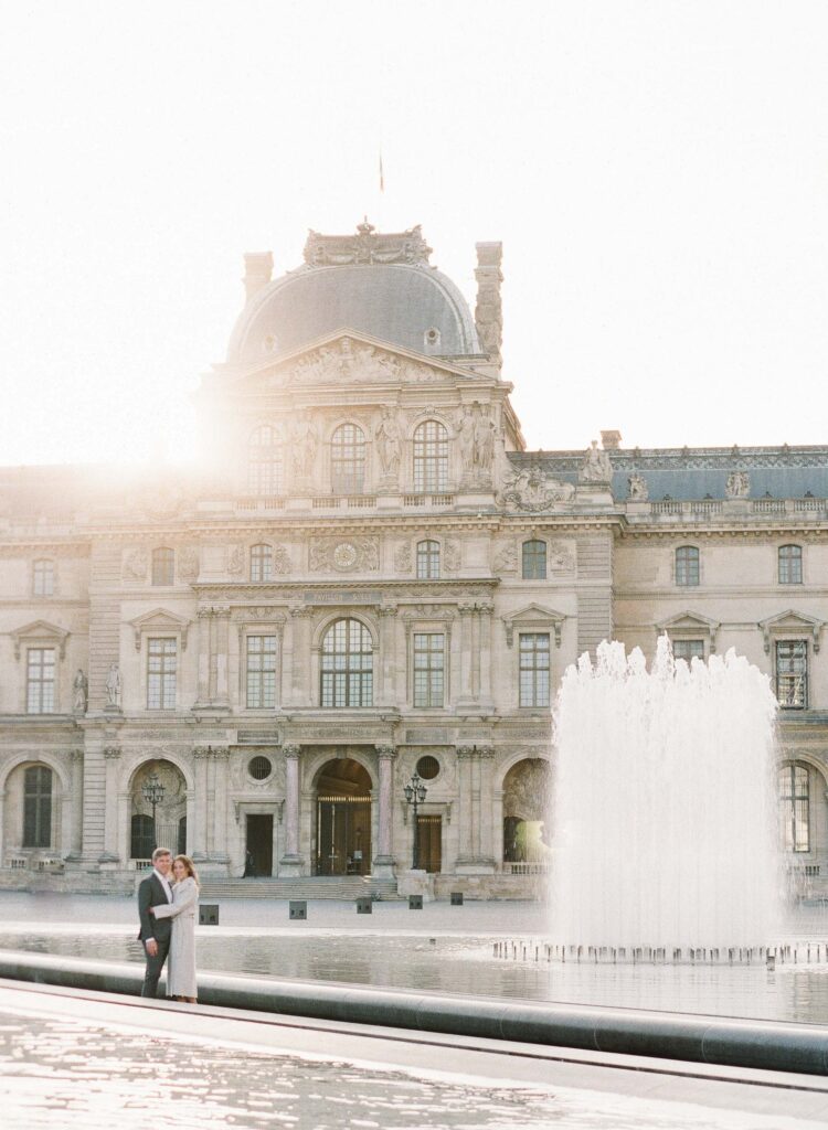 The Louvre is the most iconic photo location in Paris for your engagement session or wedding photos. 